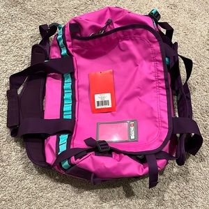 The north face base camp duffel small violetpink mountain blue Retired color NWT